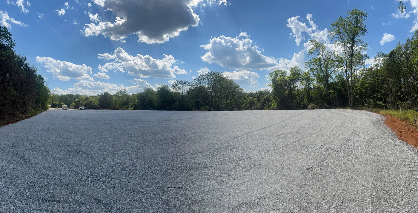 Panoramic view of graded stone lot from entrance